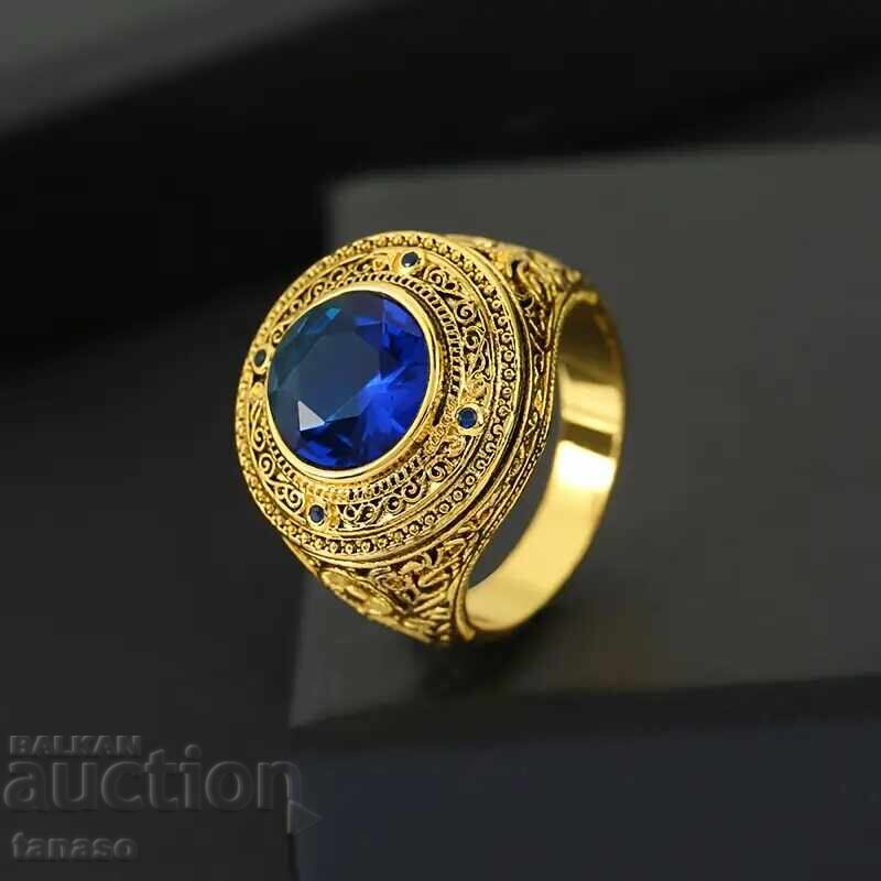 Delivery of Gold-colored ring with sapphire