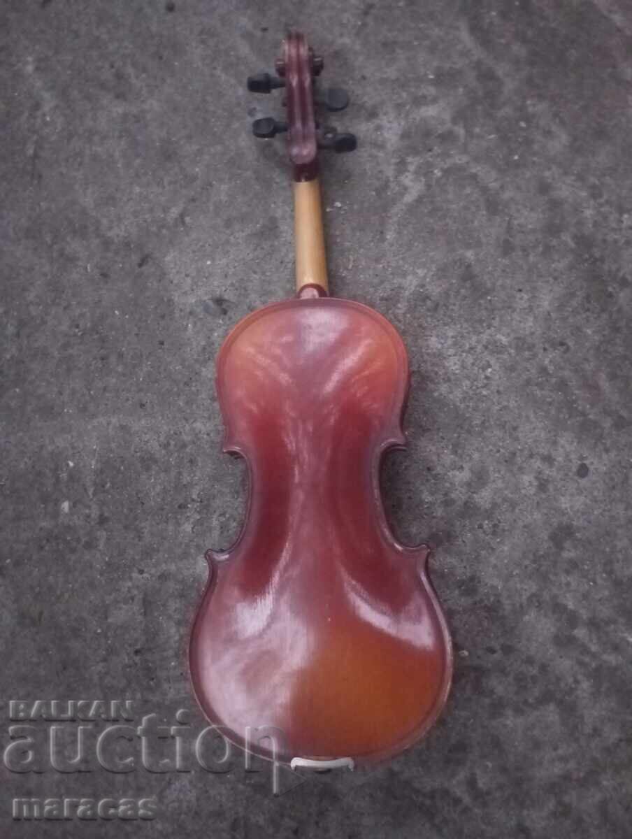 Auction  An old violin