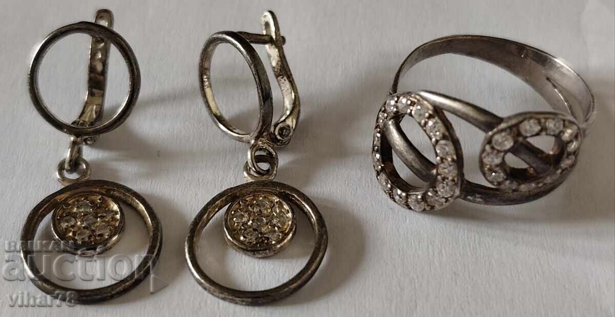 Сребърни обеци и пръстен с цена € 49.99 | 97.77 лв. Сребърни обеци и пръстен с цена € 49.99 | 97.77 лв.