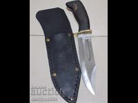 Hunting knife in a sheath with a buffalo horn handle