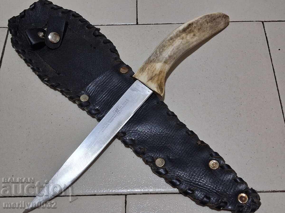 Licitație Cuțit de vânătoare în teacă cu mâner din corn de cerb