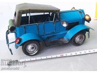 Ρετρό μπλε μεταλλικό αυτοκίνητο