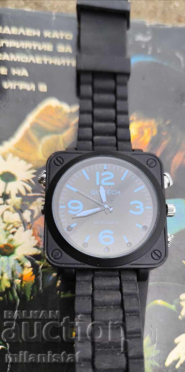 Watch that records video and takes photos