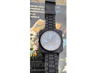 Watch that records video and takes photos