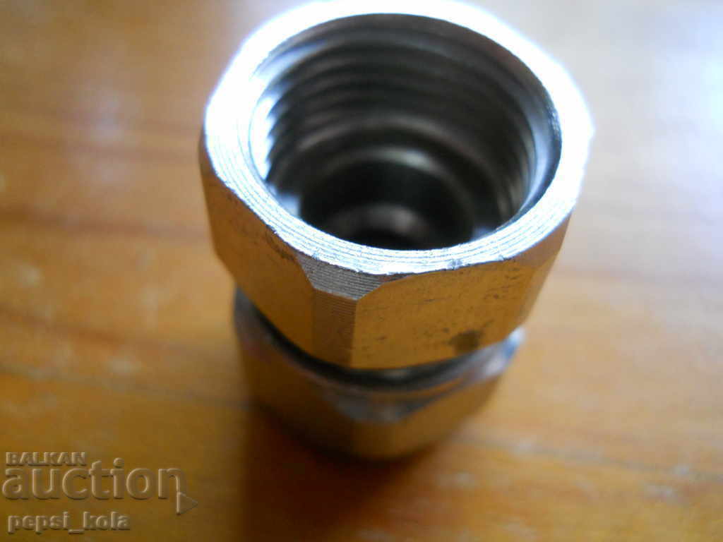 Auction  Metal plumbing fitting