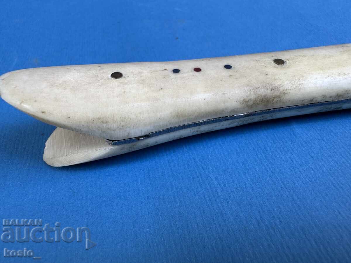 Auction  Old knife with a bone handle