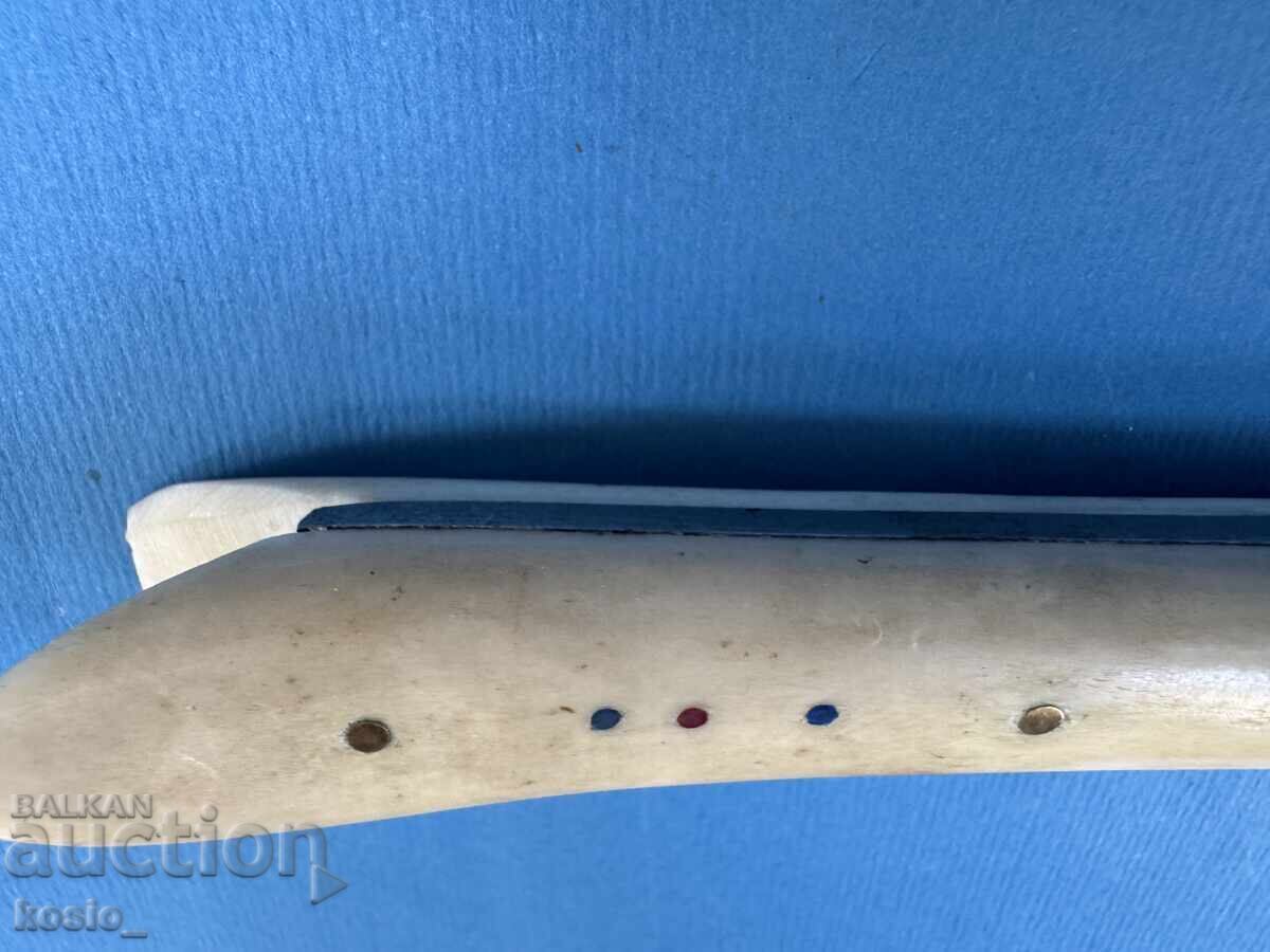 Delivery of Old knife with a bone handle