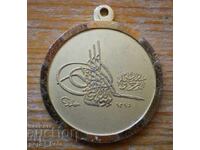 Medalion vechi cu tuğra