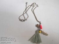 Necklace with pendants, beads and tassel