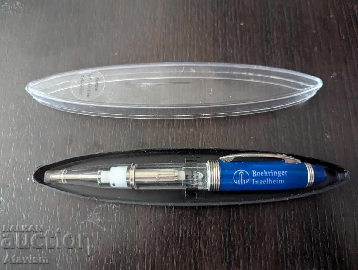Interesting pen with a flashlight from a pharmaceutical company Interesting pen with a flashlight from a pharmaceutical company