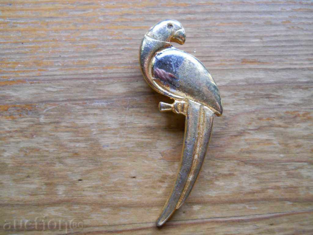 Old bronze brooch - parrot