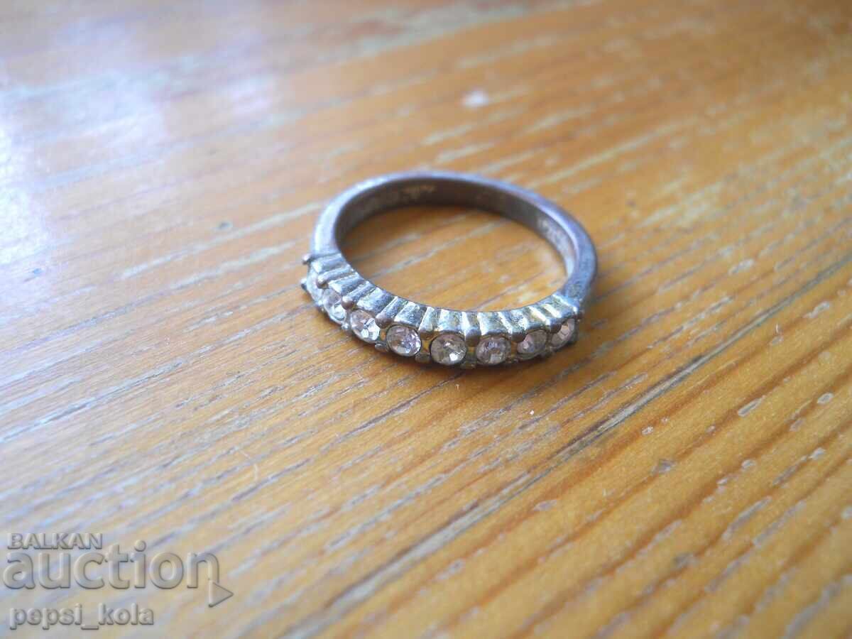 Old metal women's ring with crystals