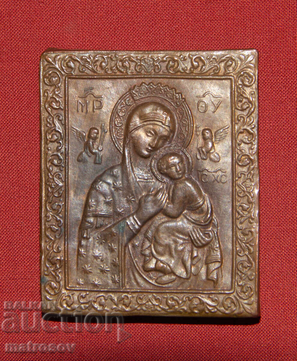 Delivery of Old copper icon of the Virgin and Child