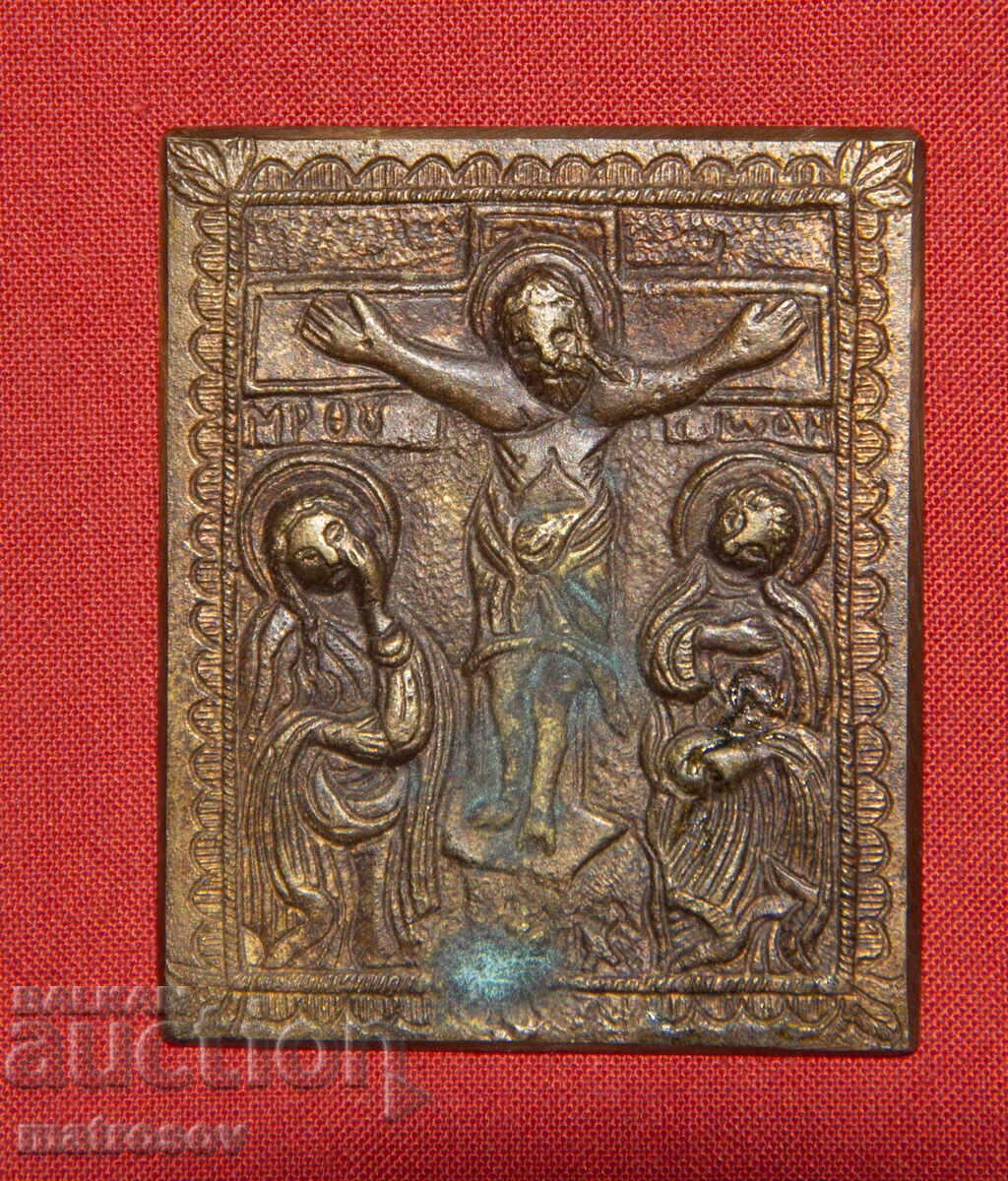 Old small bronze icon Jesus Christ on the cross