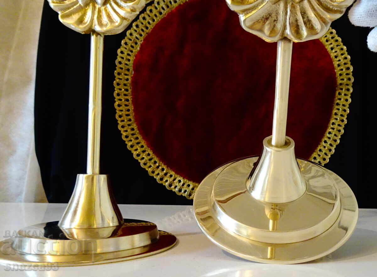 Auction  Bronze candlestick with baroque decoration, tall