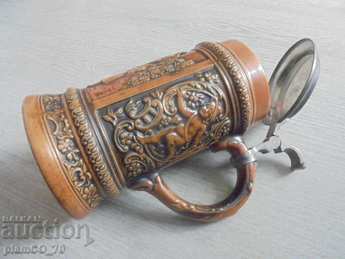 Delivery of №8264 Old porcelain mug "GERTZ" with embossed ornaments