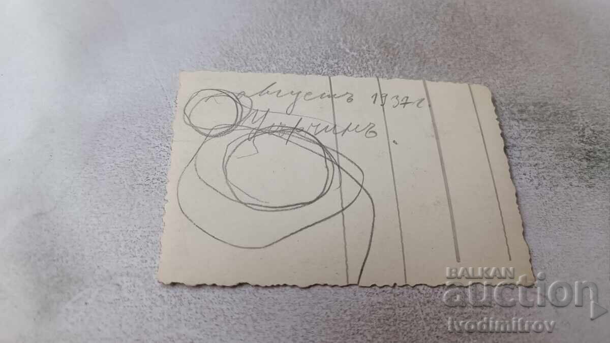 Photograph of a man, two women, and a girl on a path in the park, 1937 with price 1.65 BGN | € 0.84