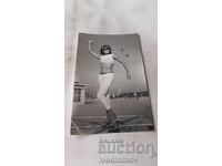 Fotografie Tineră fată pe carusel