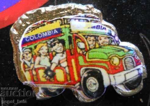 Auction  "Colombia" badge on a pin