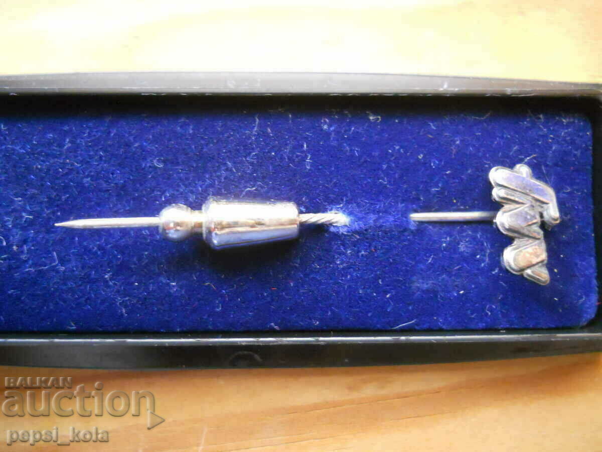 Σήμα "FNV" σε κουτί - ομοσπονδία ολλανδικών συνδικάτων