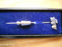 Σήμα "FNV" σε κουτί - ομοσπονδία ολλανδικών συνδικάτων