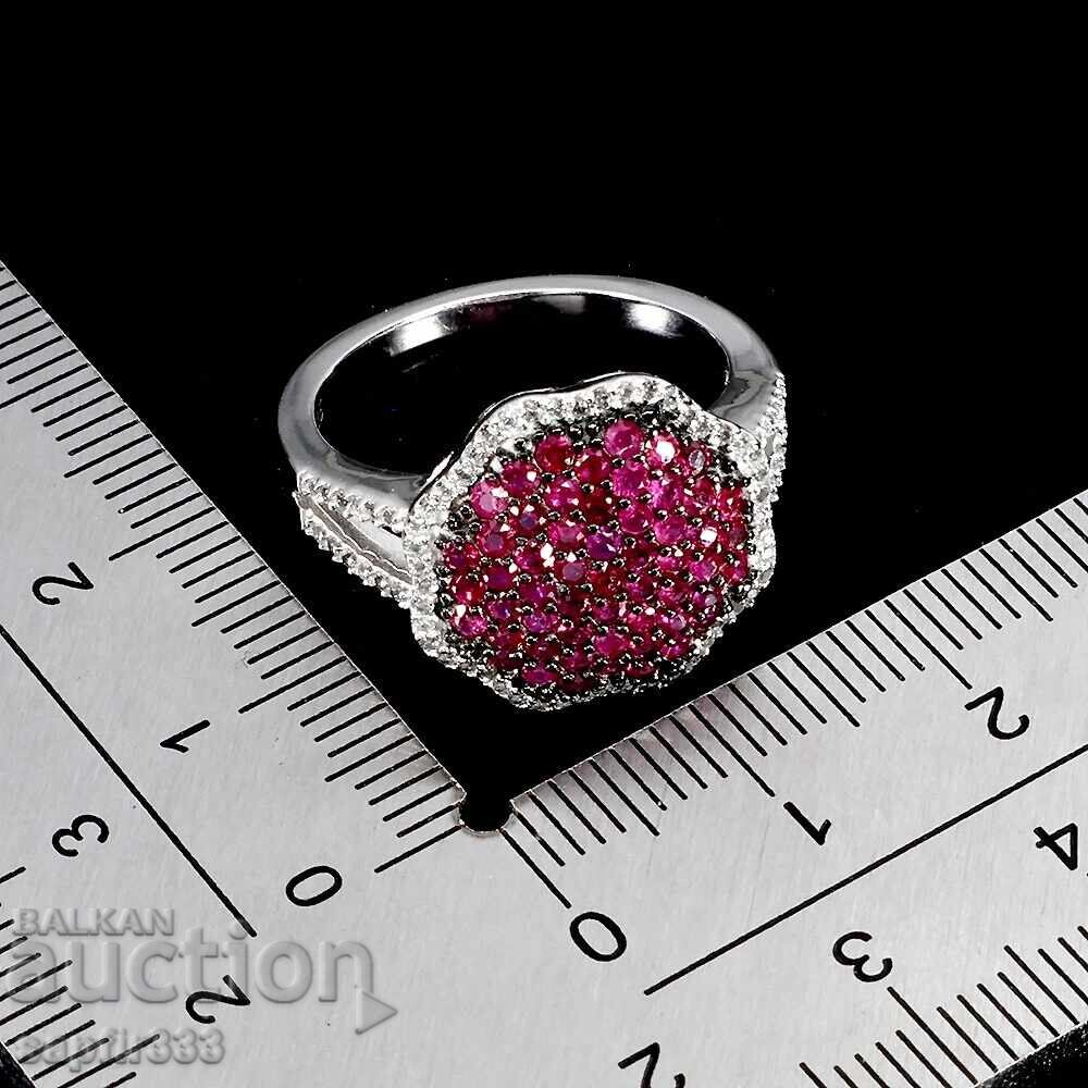 Auction  DESIGNER RING WITH NATURAL RUBIES AND TOPAZES