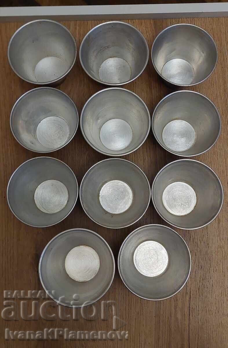 Auction Soviet-era aluminum shot glasses for connoisseurs, 11 pieces Auction Soviet-era aluminum shot glasses for connoisseurs, 11 pieces