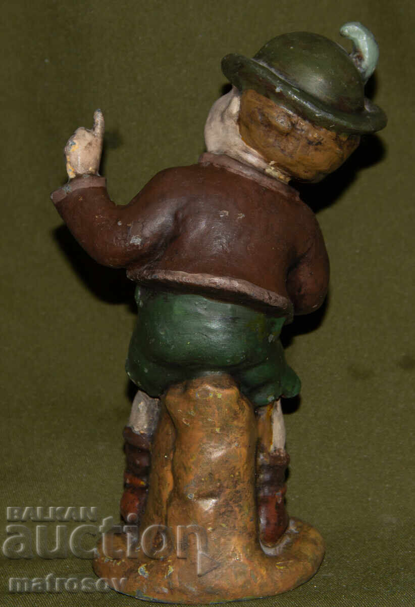 Delivery of Original metal sculpture of a boy in Bavarian costume