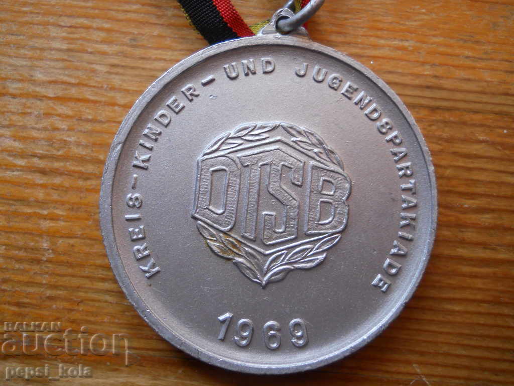Медал от детско-юношеска спартакиада - ГДР, 1969 г с цена 20.00 лв. | € 10.23