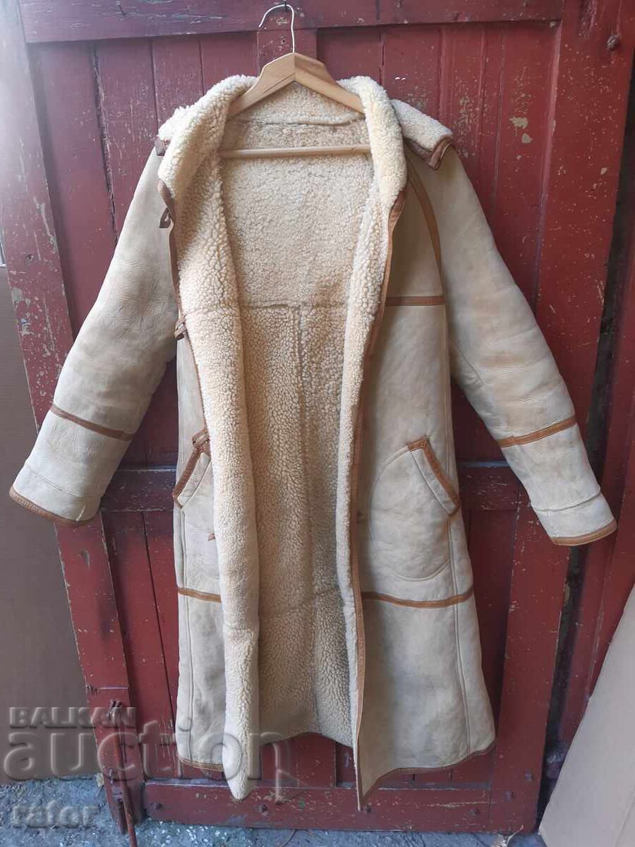 Delivery of Beautiful stylish women's coat - lambskin