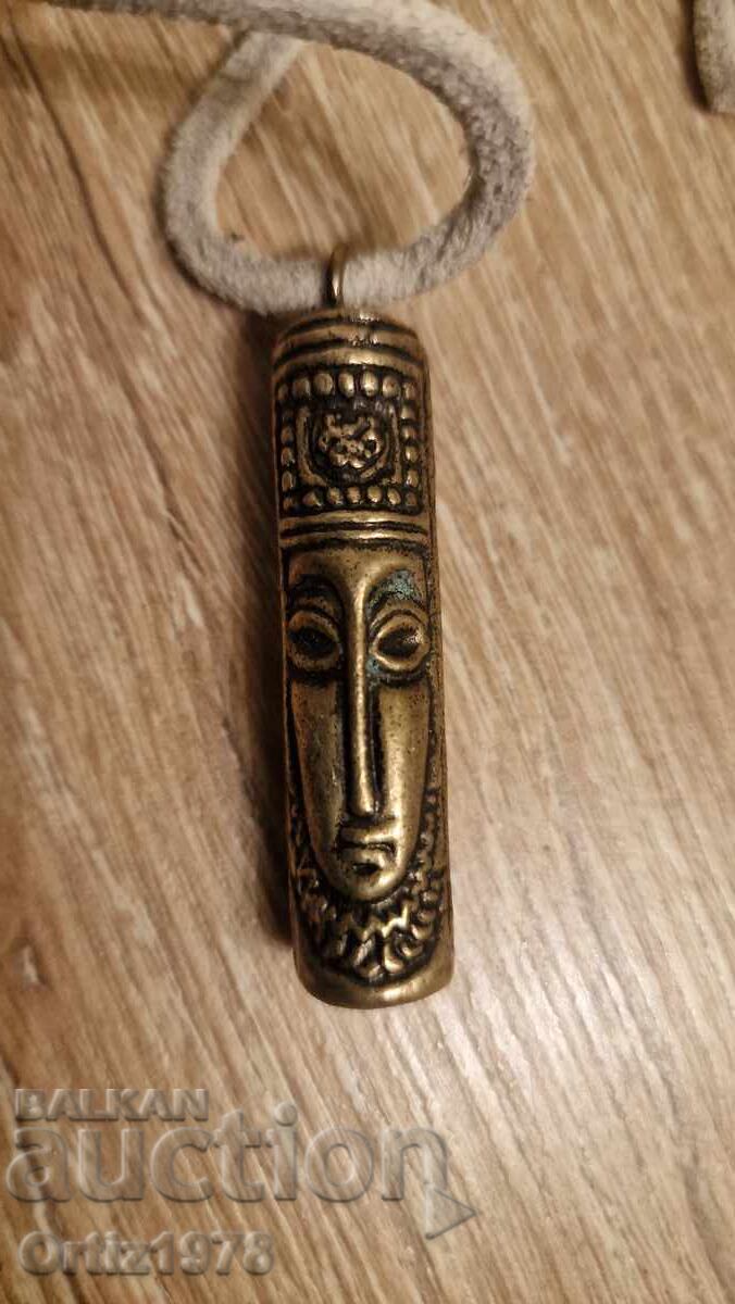 Old massive bronze amulet, two faces, 50g, natural leather Old massive bronze amulet, two faces, 50g, natural leather