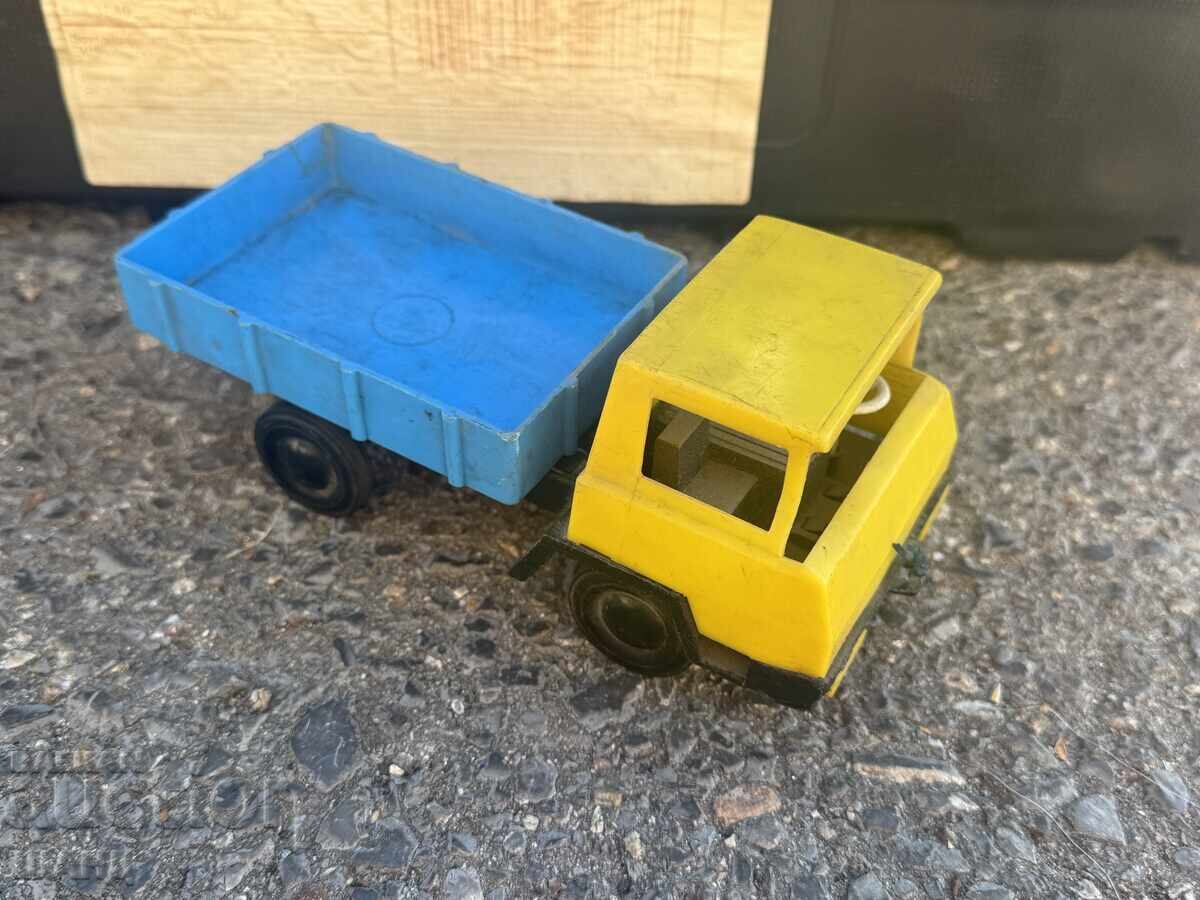 Old plastic toy truck model