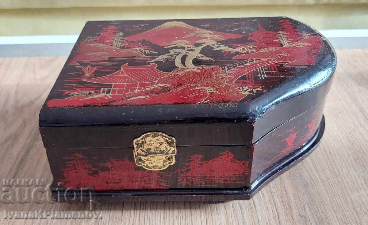 Wooden musical box with a mechanism for connoisseurs