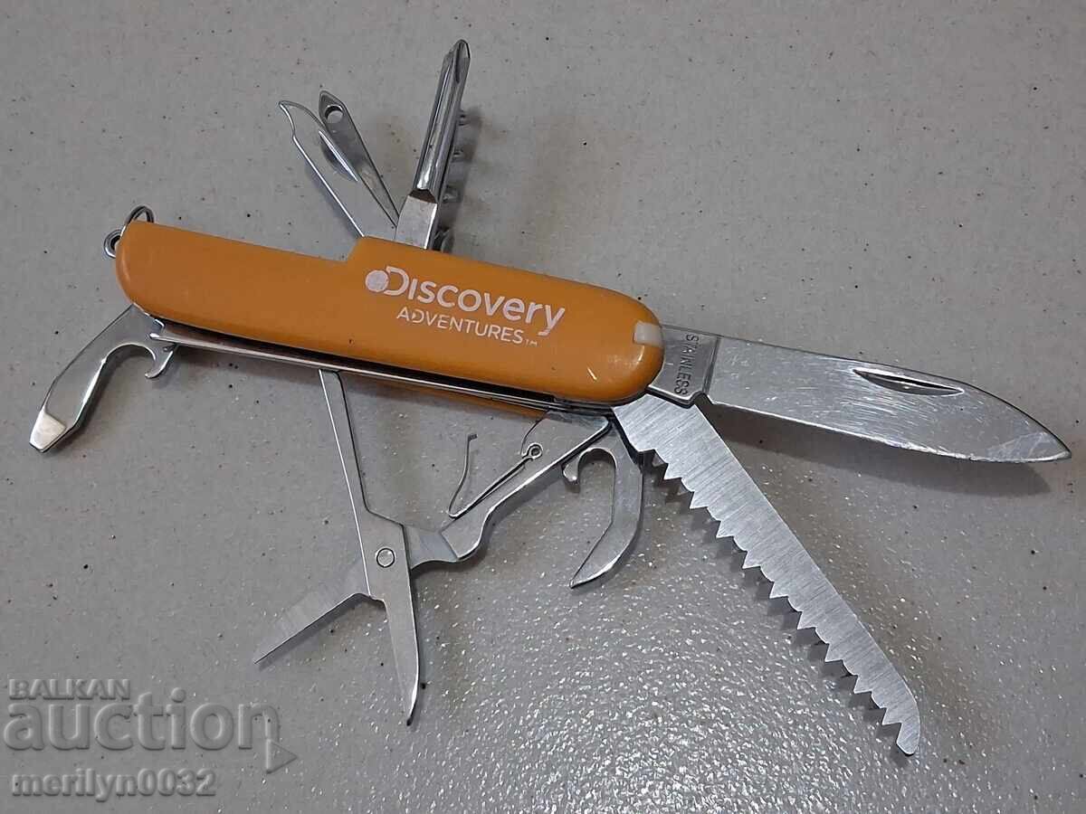 Old Discovery knife with bottle opener, corkscrew, scissors