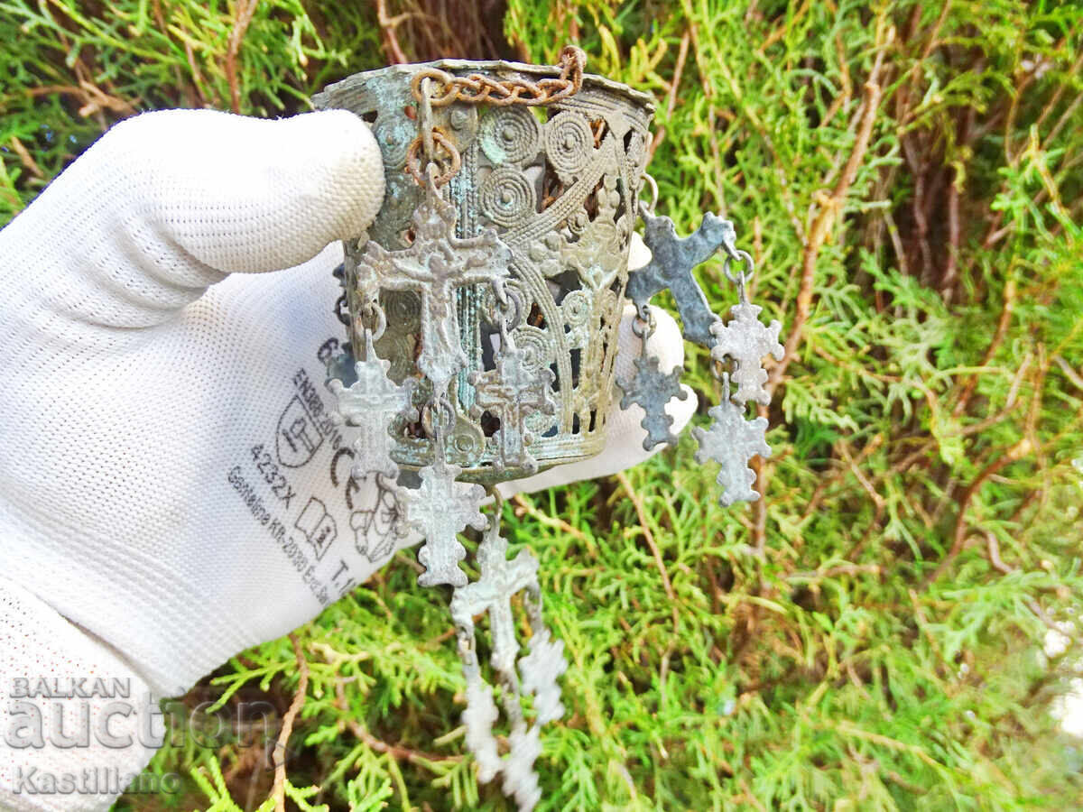 Old household bronze oil lamp with 16 small crosses