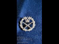 Σήμα, κονκάρδα, μετάλλιο σκοποβολής