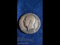 Σήμα, κονκάρδα, μετάλλιο σκοποβολής