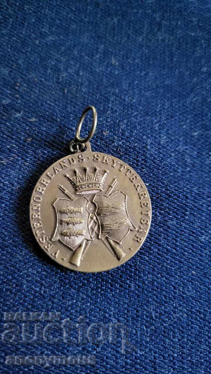 Σήμα, κονκάρδα, μετάλλιο σκοποβολής Σήμα, κονκάρδα, μετάλλιο σκοποβολής