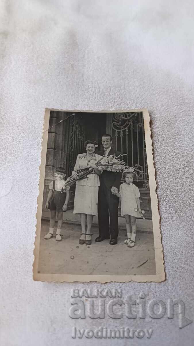 Sofia Photo: Man, Woman with Bouquet of Flowers, Boy and Girl