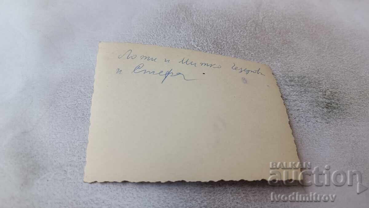 Photo Sofia Man and two women in front of the Mineral Baths with price 2.15 BGN | € 1.10