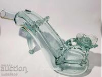 Decanter for alcohol in the shape of Cinderella's shoe