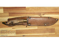 Solid hunting knife with a hoof handle