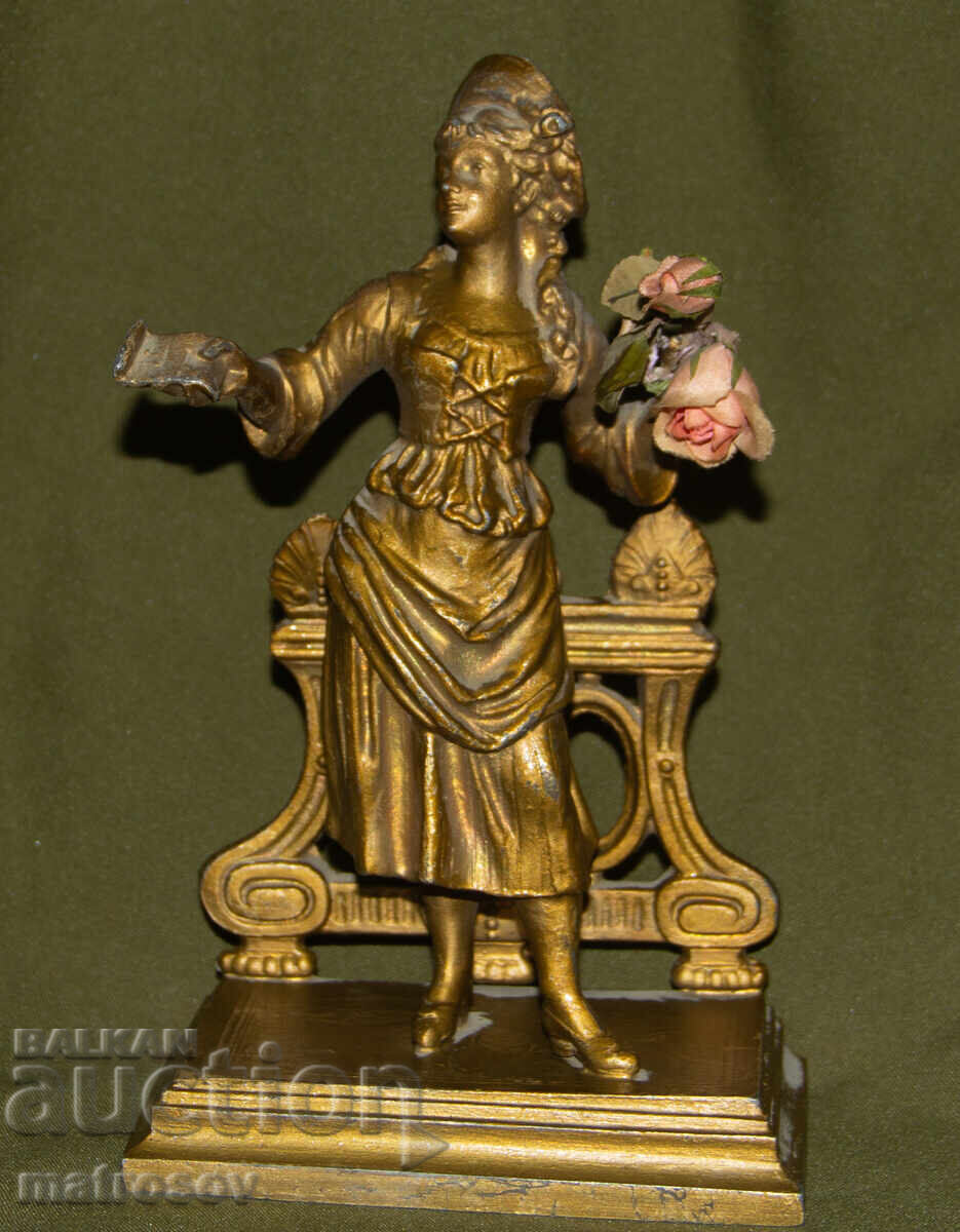 Old metal decorative statue sculpture woman with flowers with price 280.00 BGN | € 143.16 Old metal decorative statue sculpture woman with flowers with price 280.00 BGN | € 143.16