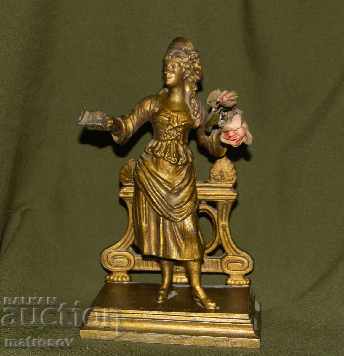 Delivery of Old metal decorative statue sculpture woman with flowers Delivery of Old metal decorative statue sculpture woman with flowers