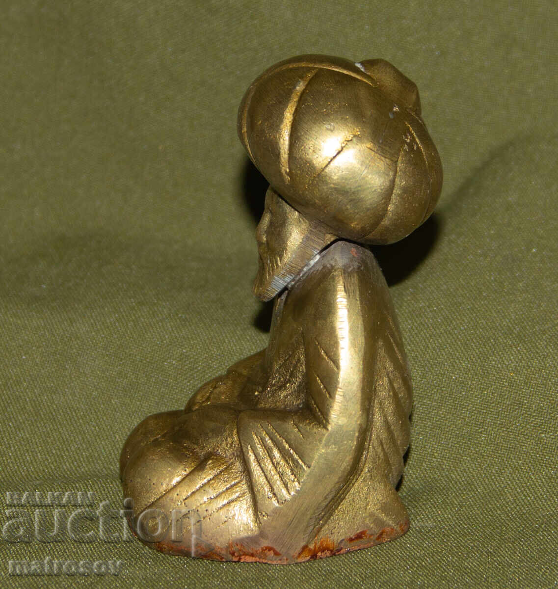 Delivery of Small bronze figure sculpture of a man with a turban