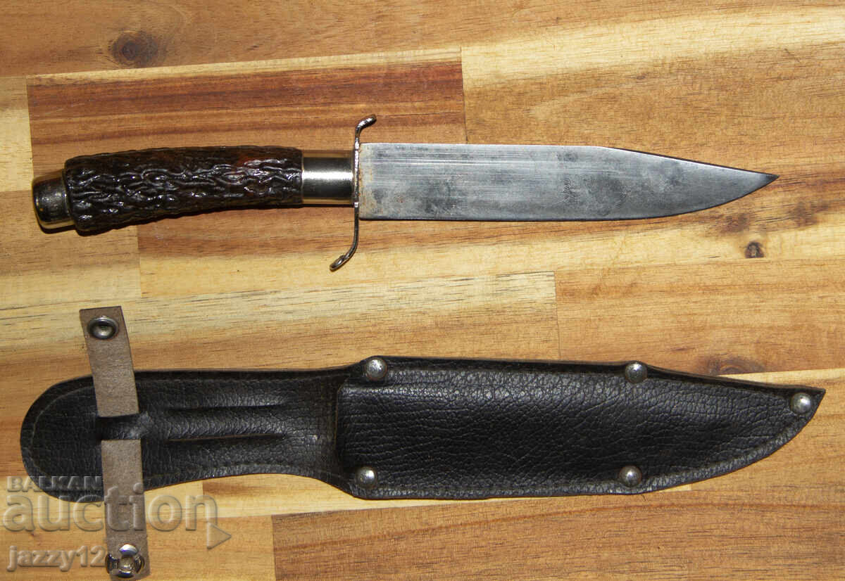 Auction Solid hunting knife with leather sheath Auction Solid hunting knife with leather sheath