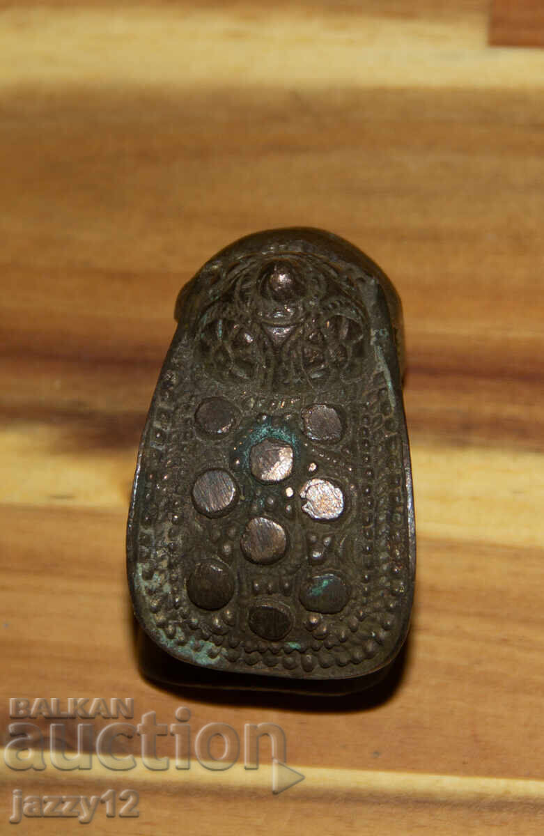 Delivery of Old bronze slingshot bracelet