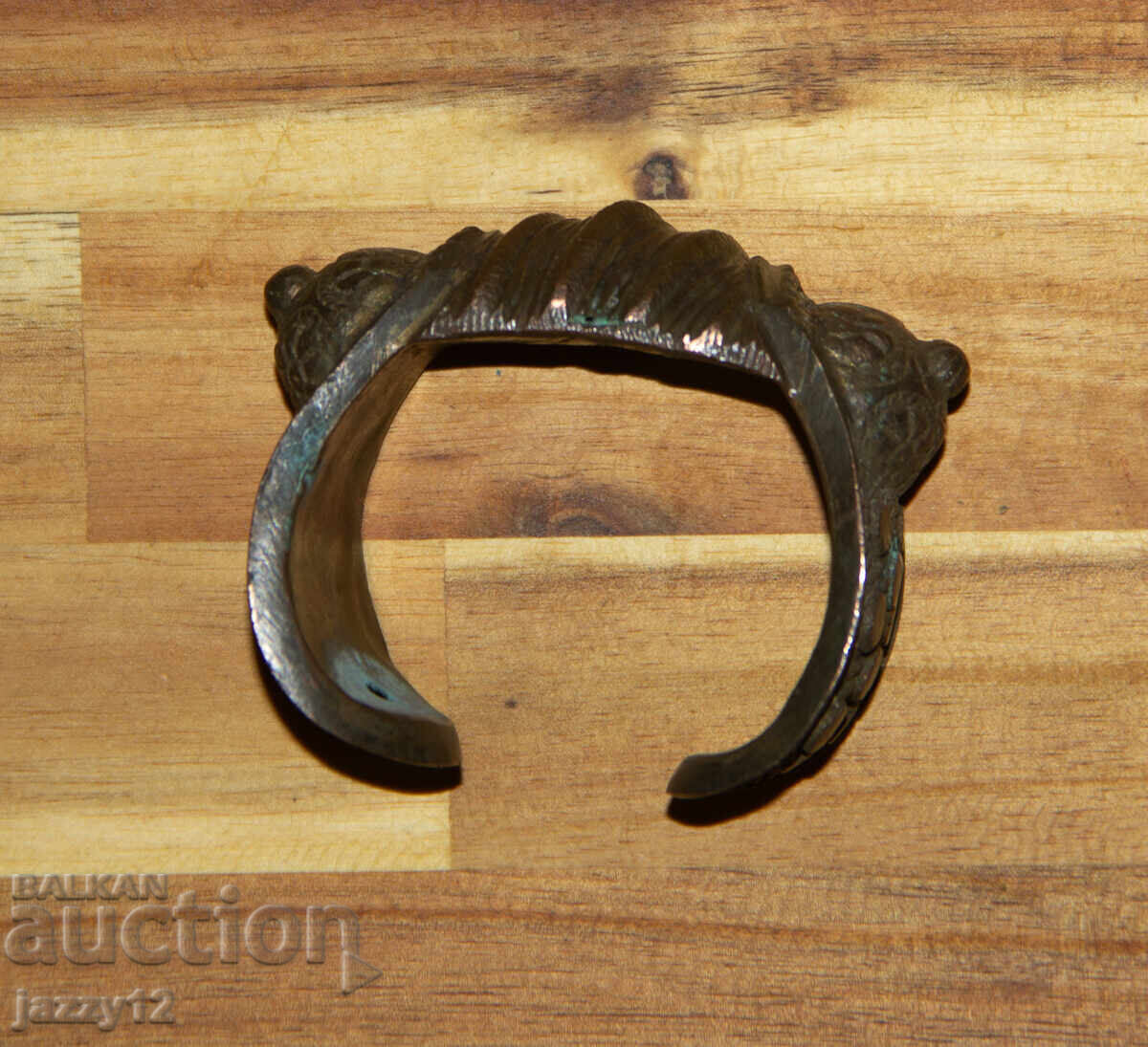 Old bronze slingshot bracelet