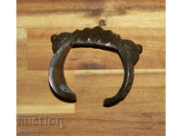 Brățară veche de bronz tip praștie