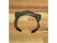 Brățară veche de bronz tip praștie